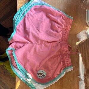 Stylish Pink Athletic Shorts with Teal Trim